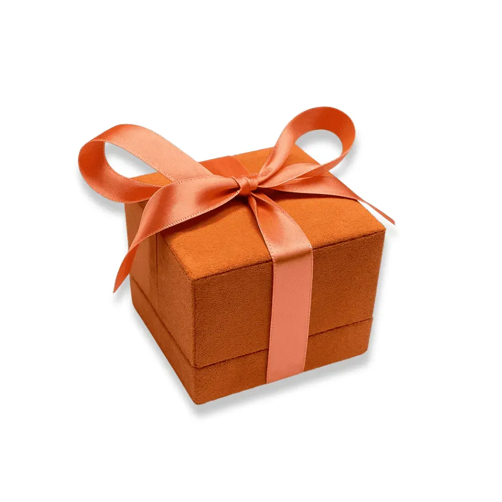 Orangefarbenes Geschenketui mit Schleife