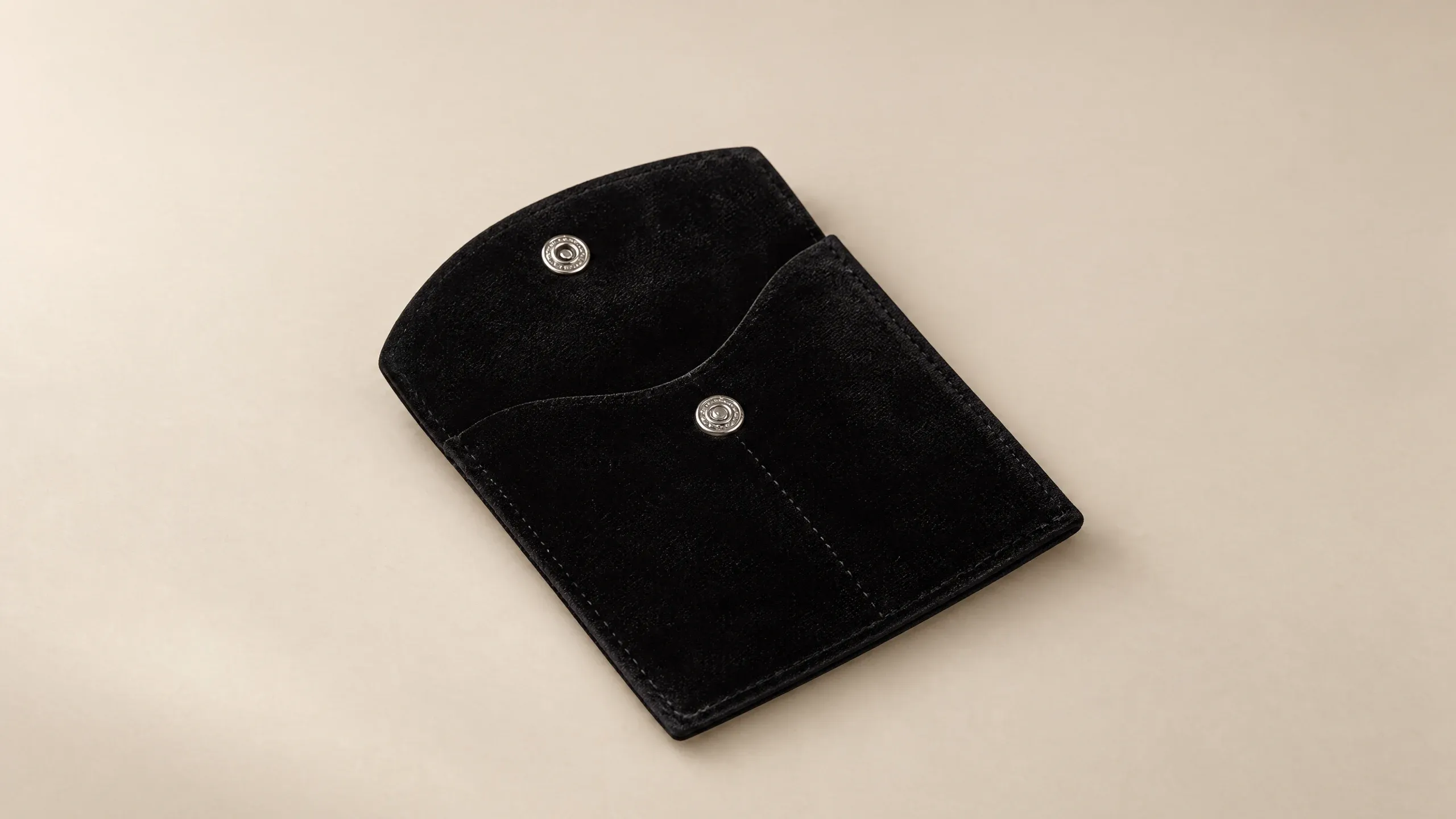 Jewellery pouch with compartments in Black, lying flat, closed