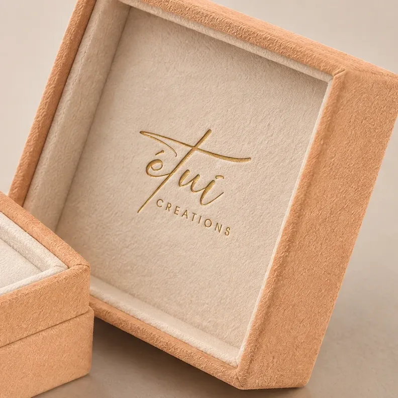 Gold-stamped logo inside the lid